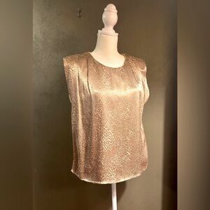 Gold short sleeve top with box pleates at shoulders, shoulder pads, lined